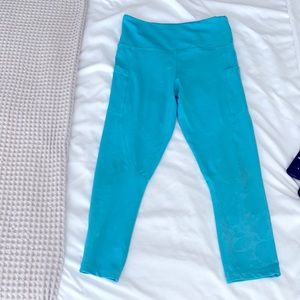 Zyia 4 leggings, compression, pockets, 3/4 length.